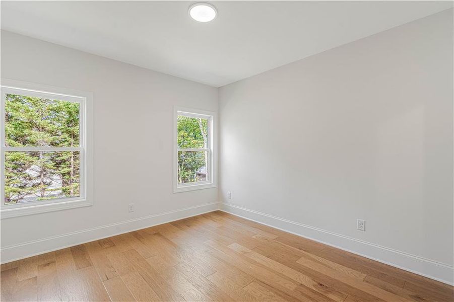 Spacious, unfurnished interior of a new home in Bellwyn, Johns Creek (Image 56).