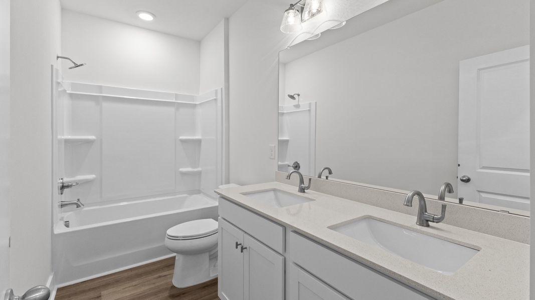 Furnished interior view inside a new home in Bluffs at Sun Colony, Longs (Image 18).