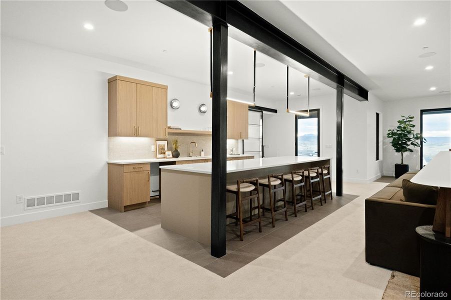 Furnished interior view inside a new home in Signature at Crystal Valley, Castle Rock (Image 28).