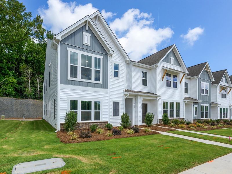 Front exterior of a new home in Westwood Reserve, Charlotte, NC, highlighting curb appeal (Image 27). Front exterior of a new home in Westwood Reserve, Charlotte, NC, highlighting curb appeal (Image 27).