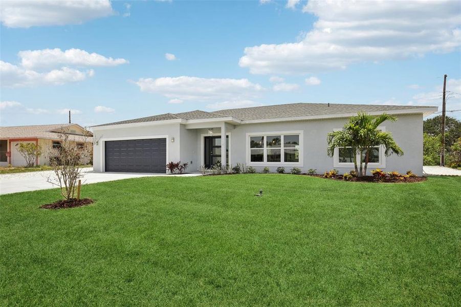 Front exterior of a new home in , Sun City Center, FL, highlighting curb appeal (Image 22).
