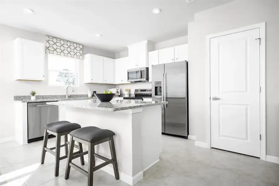 Furnished interior view inside a new home in Terra Lago Townhomes, Indiantown (Image 4). Furnished interior view inside a new home in Terra Lago Townhomes, Indiantown (Image 4).