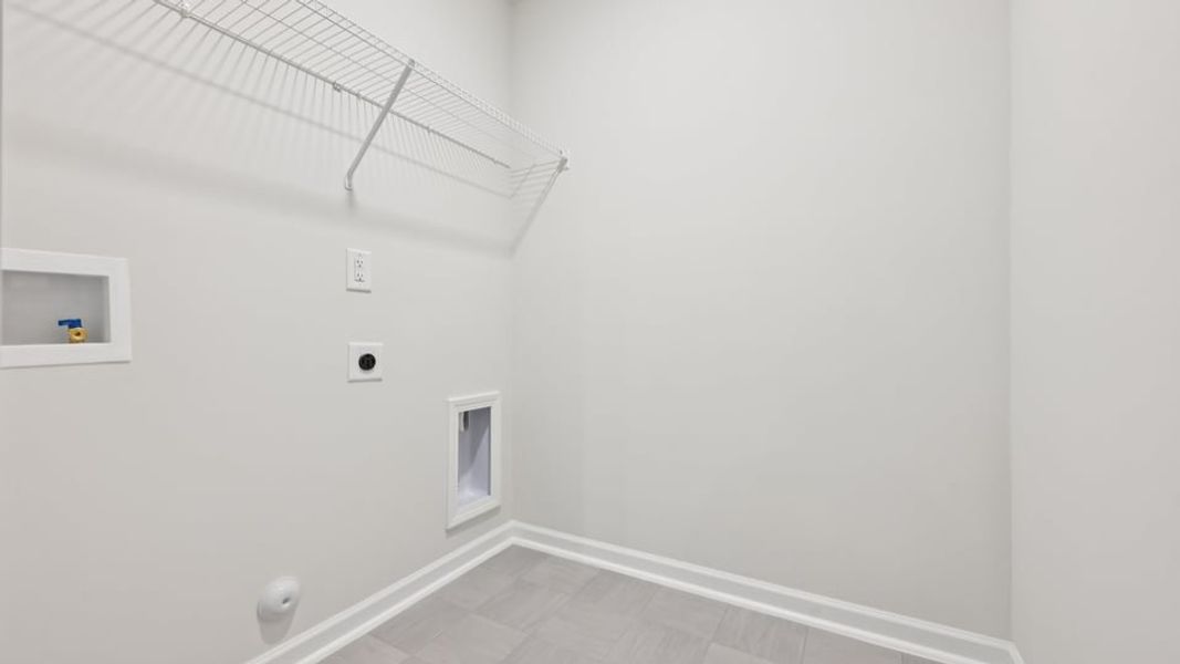 Spacious, unfurnished interior of a new home in Gretchen Pines, West End (Image 25).