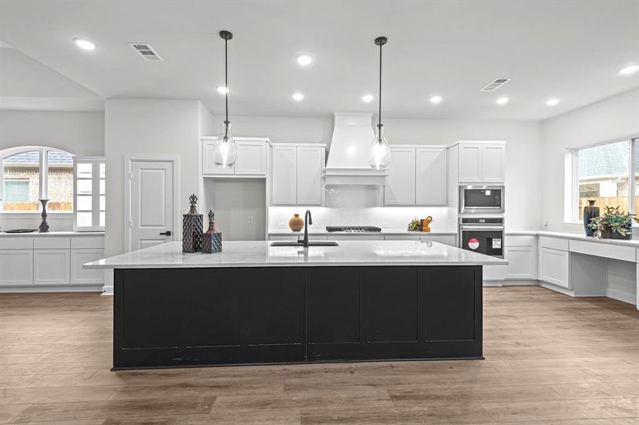 EXAMPLE PHOTO: Gorgeous Kitchen with Midnight mystique lower cabinets at Kitchen and Dining.