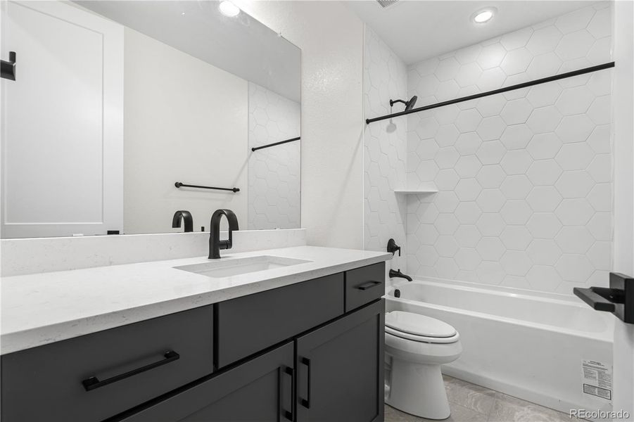 Furnished interior view inside a new home in Reflection at Solstice, Littleton (Image 19).