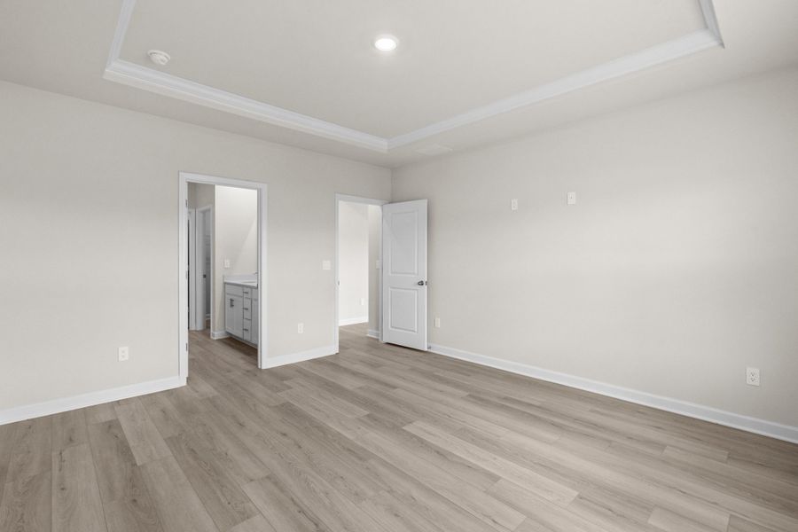 Spacious, unfurnished interior of a new home in Cypress Ridge - The Coastline Series, Longs (Image 21).