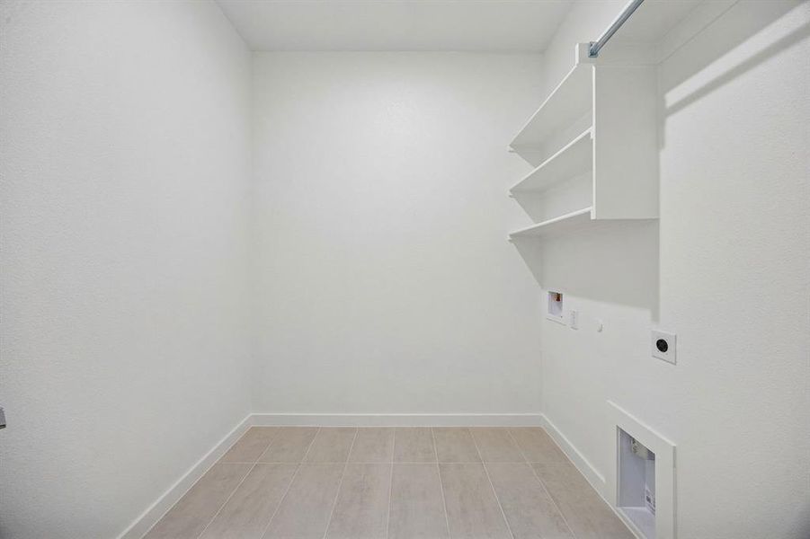 Utility Room in the Gilmour II home plan by Trophy Signature Homes – REPRESENTATIVE PHOTO