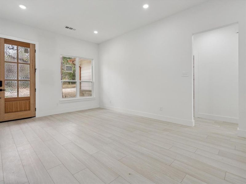 Spare room featuring light hardwood / wood-style floors