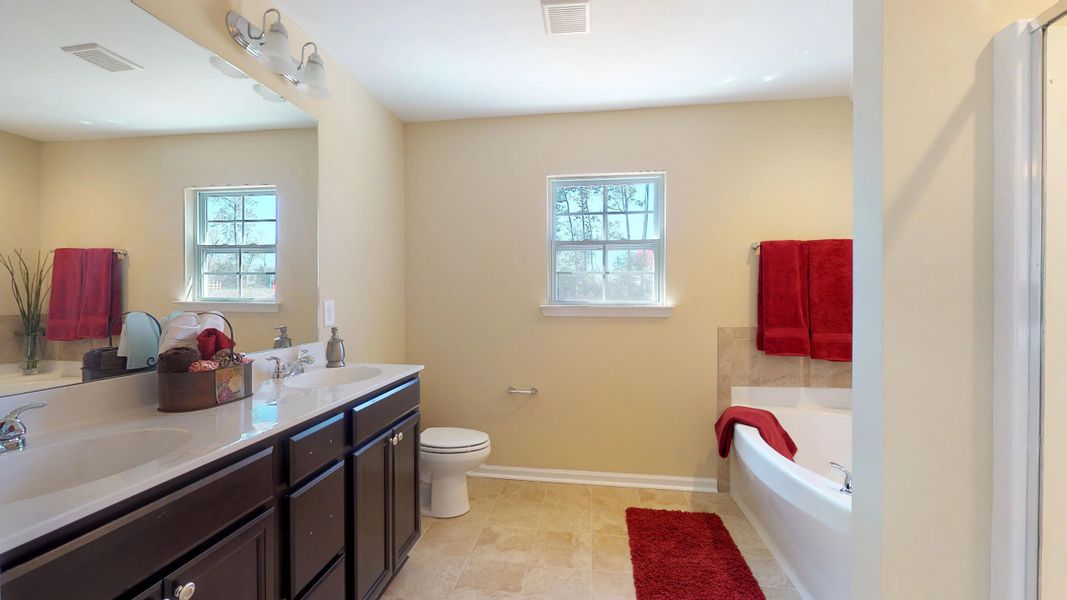 Representative furnished interior of a home built from the Wyatt by Bill Clark Homes in Davenport Farms, Winterville (Image 15).