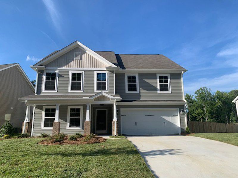 Representative exterior photo of a completed home built from the Kendall by Keystone Homes NC in Avondale, Greensboro, NC (Image 33). Representative exterior photo of a completed home built from the Kendall by Keystone Homes NC in Avondale, Greensboro, NC (Image 33).