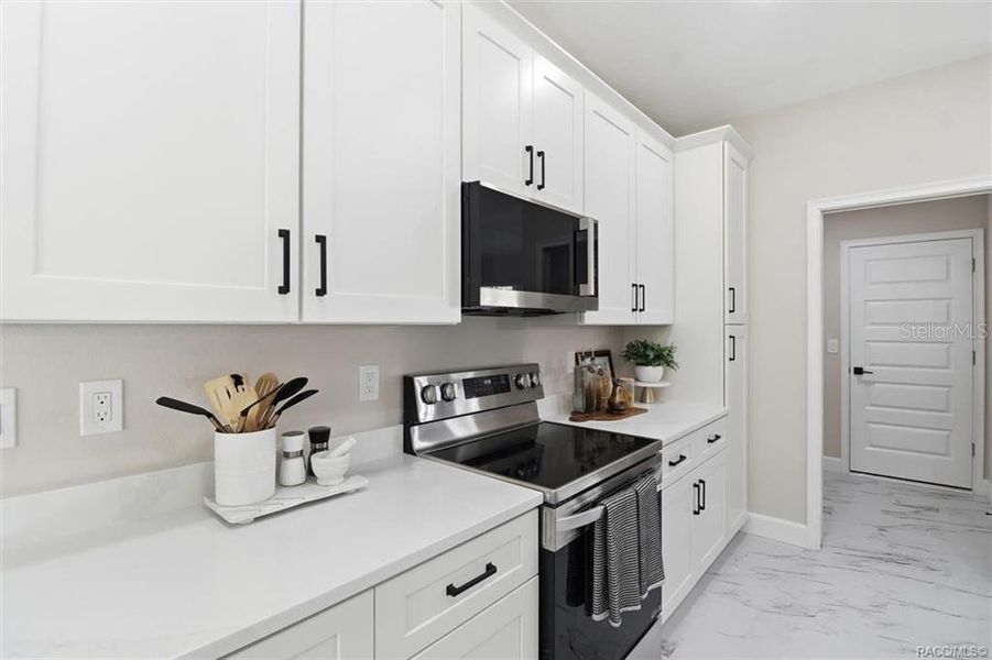 Furnished interior view inside a new home in , Citrus Springs (Image 20).