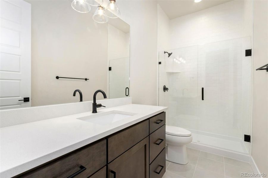 Furnished interior view inside a new home in Acadia at RainDance, Windsor (Image 6).