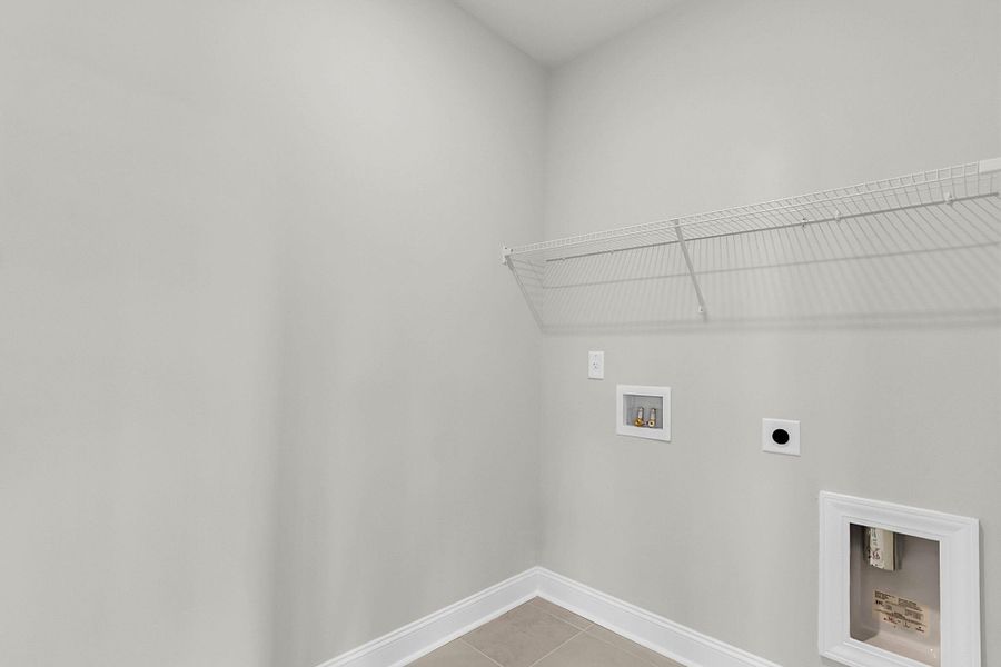 Spacious, unfurnished interior of a new home in Tidewater at Lakes of Cane Bay, Summerville (Image 43).