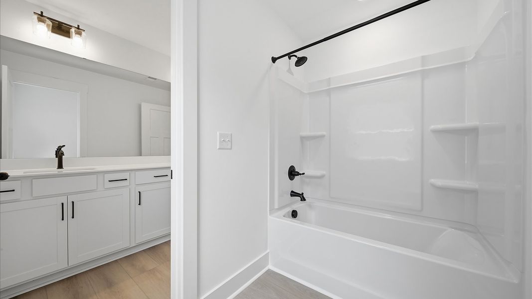 First-class guest bath featuring stylish fixtures and modern design elements First-class guest bath featuring stylish fixtures and modern design elements