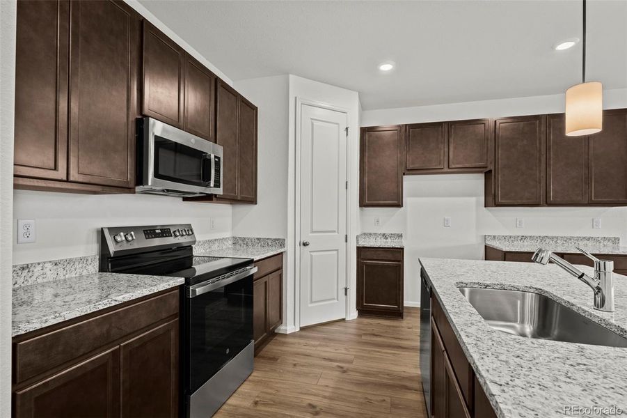 Furnished interior view inside a new home in Terrain Oak Valley, Castle Rock (Image 5).