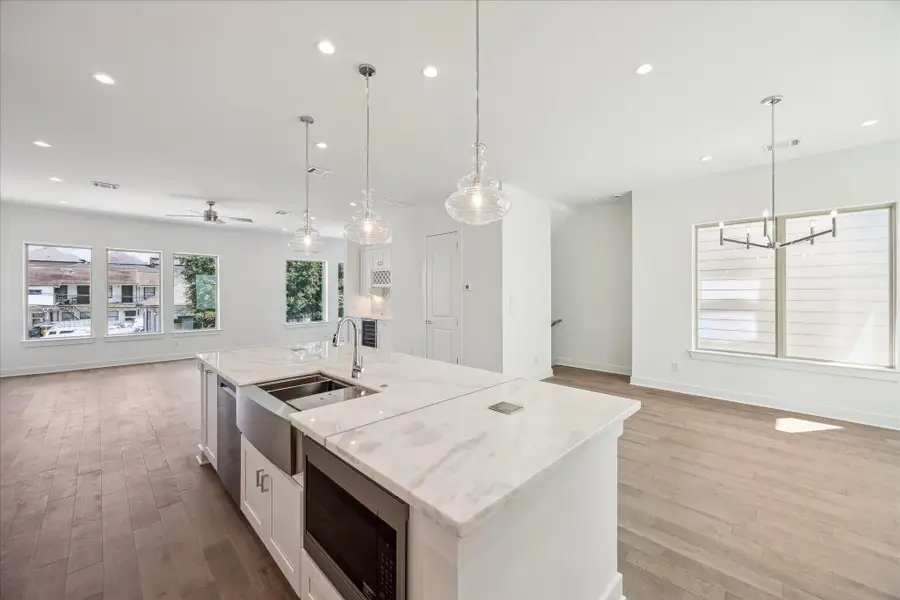 Island has a Microwave, Sink, Dishwasher and Cabinets. Island has a Microwave, Sink, Dishwasher and Cabinets.