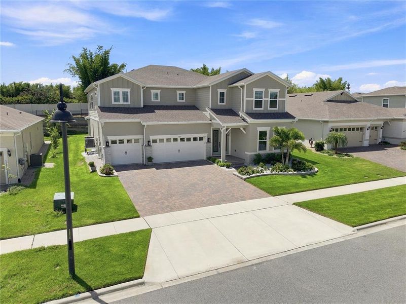 Front exterior of a new home in , Winter Garden, FL, highlighting curb appeal (Image 28).