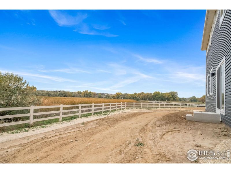 Exterior details and patio area of a home in Thompson River Ranch, Johnstown (Image 26).