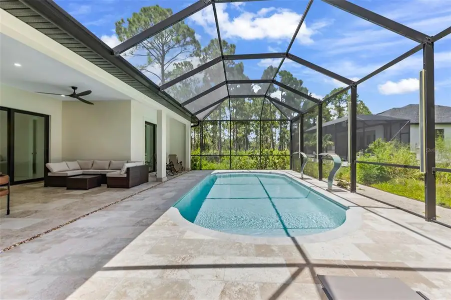 Exterior details and patio area of a home in , North Port (Image 20).