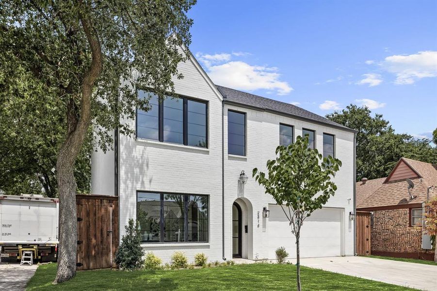 Front exterior of a new home in , Dallas, TX, highlighting curb appeal (Image 2).