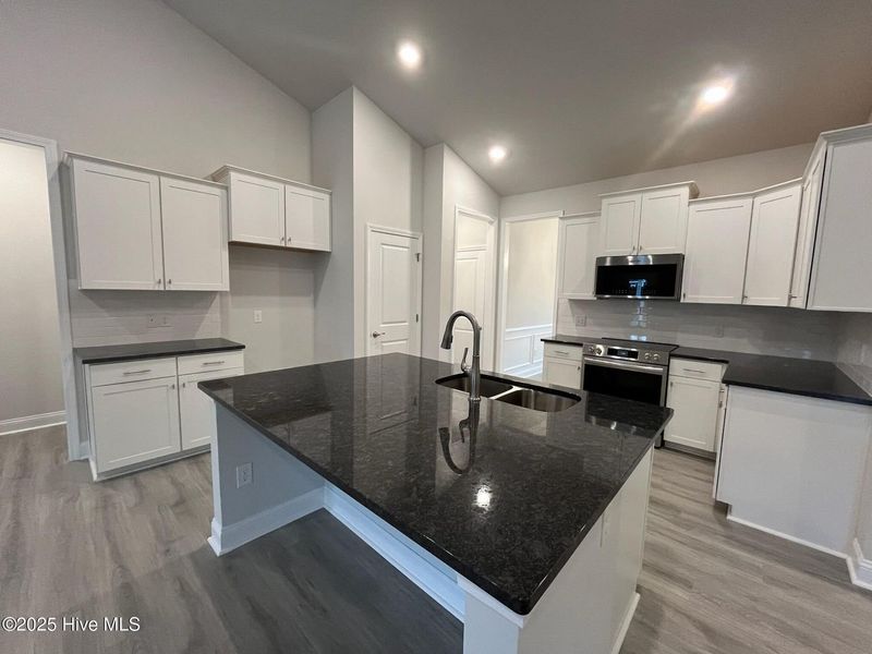 Furnished interior view inside a new home in Palmetto Creek, Bolivia (Image 6).
