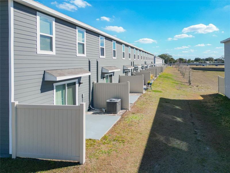 Exterior details and patio area of a home in The Towns at Laurel Commons, Ocala (Image 25).
