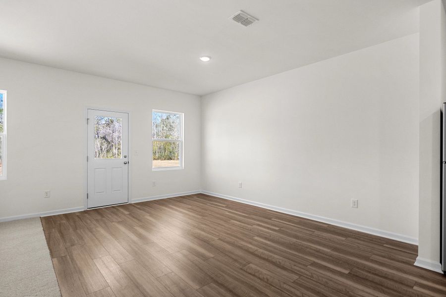 Representative unfurnished interior of a home built from the Highland by Starlight Homes in Sutton Farms, San Antonio (Image 14).