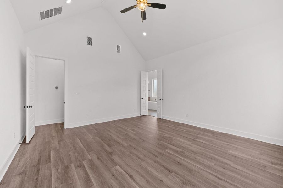 Primary Bedroom with elevated ceiling