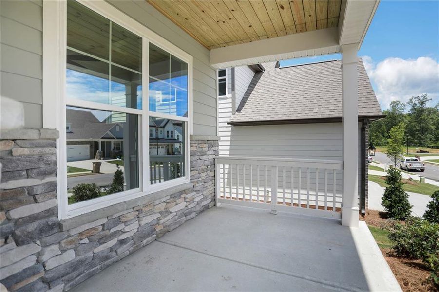 Exterior details and patio area of a home in Twin Lakes, Hoschton (Image 26).