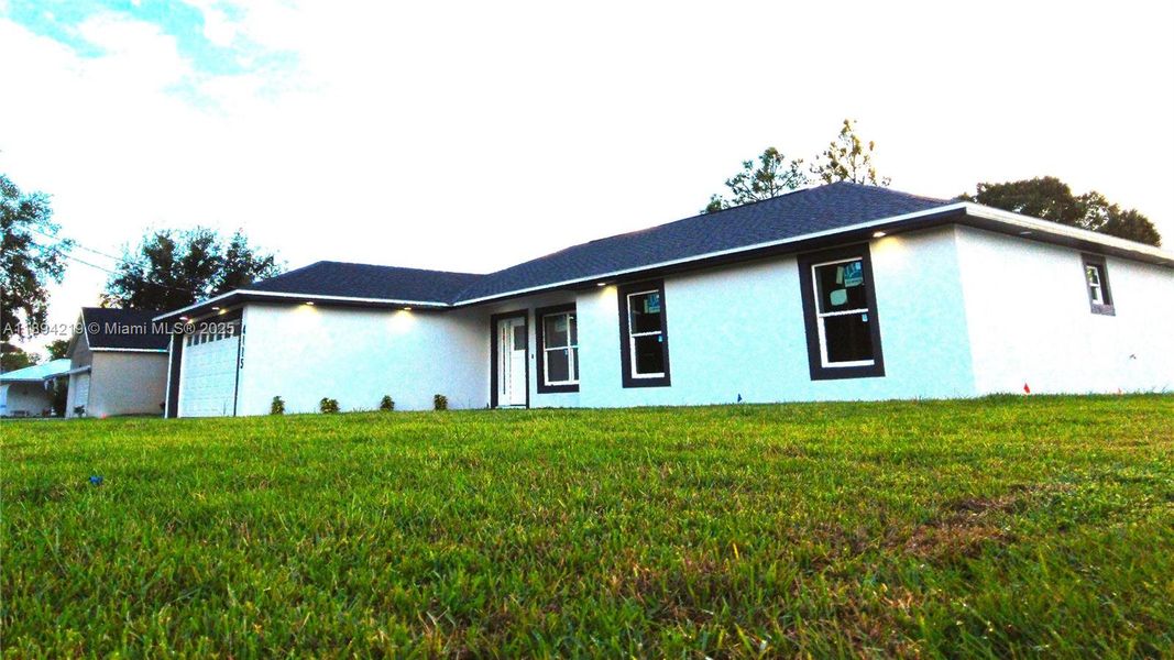 Exterior details and patio area of a home in , Sebring (Image 16). Exterior details and patio area of a home in , Sebring (Image 16).