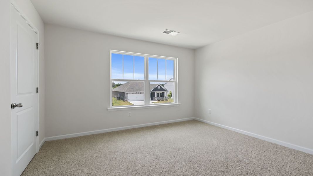 Spacious, unfurnished interior of a new home in Durbin Meadows Traditions, Fountain Inn (Image 19).