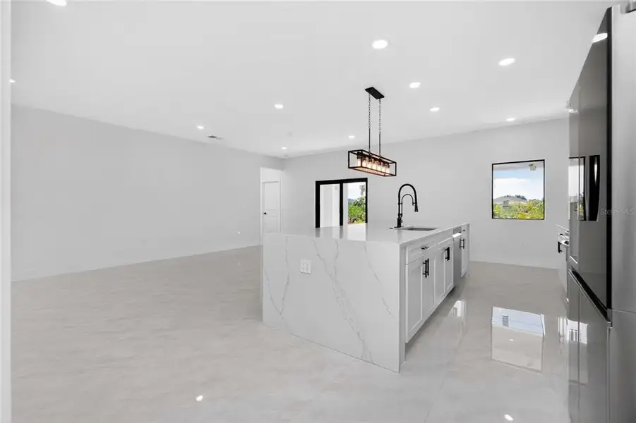 Furnished interior view inside a new home in , Port Charlotte (Image 42).