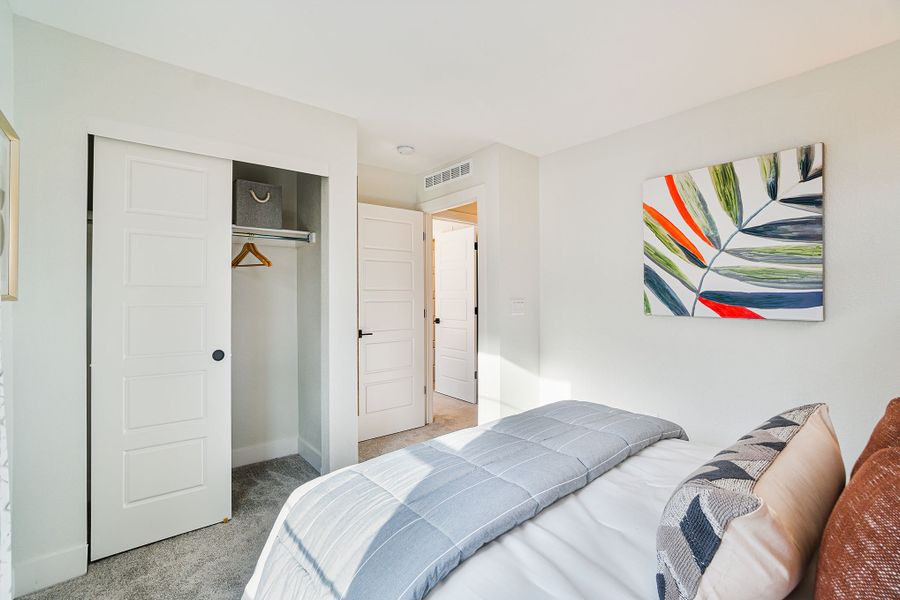 Representative furnished interior of a home built from the Emmet by Lokal Homes in The Commons at Victory Ridge, Colorado Springs (Image 11).