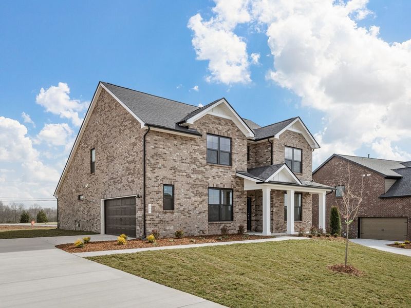 Front exterior of a new home in Benders Cove, Mount Juliet, TN, highlighting curb appeal (Image 25).