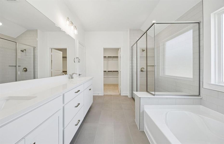 Elegant owner's bathroom with dual vanity *real home pictured Elegant owner's bathroom with dual vanity *real home pictured