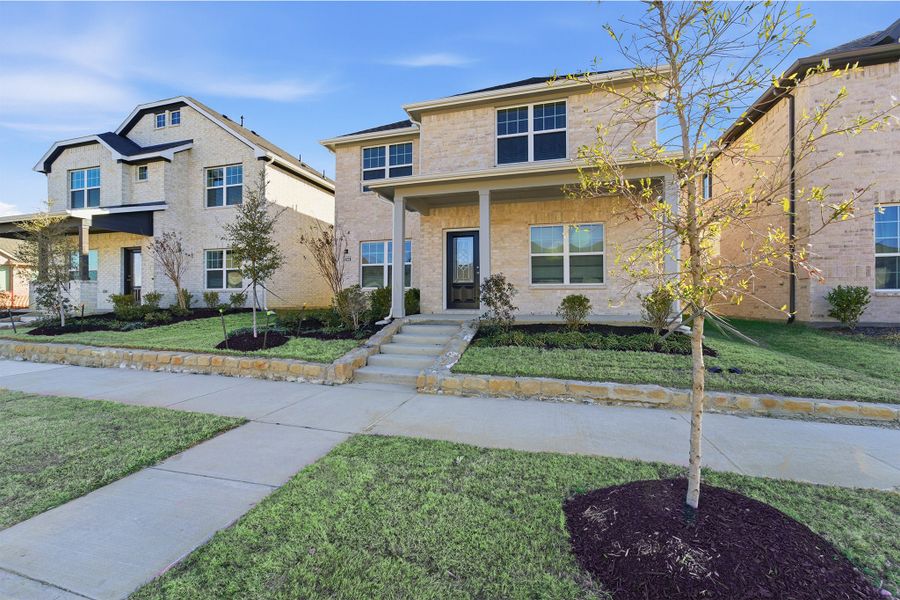 Front exterior of a new home in La Terra, Celina, TX, highlighting curb appeal (Image 2).