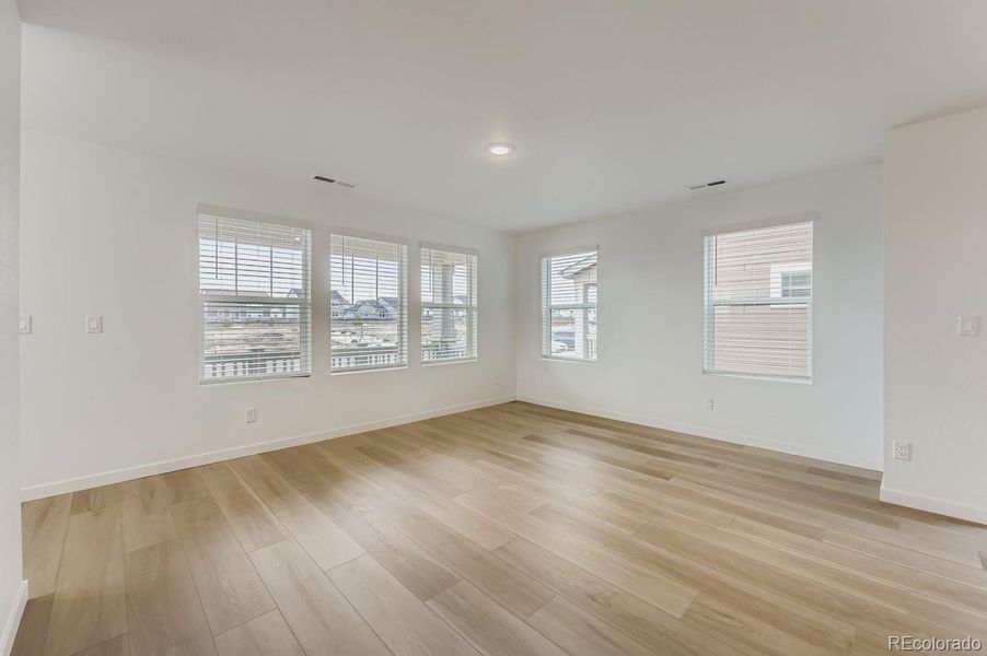 Spacious, unfurnished interior of a new home in Percheron: The Explorer Collection, Colorado Springs (Image 7).