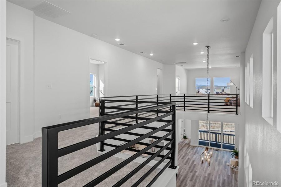 Spacious, unfurnished interior of a new home in Revel Crossing at Wolf Ranch - The Panorama Collection, Colorado Springs (Image 29).