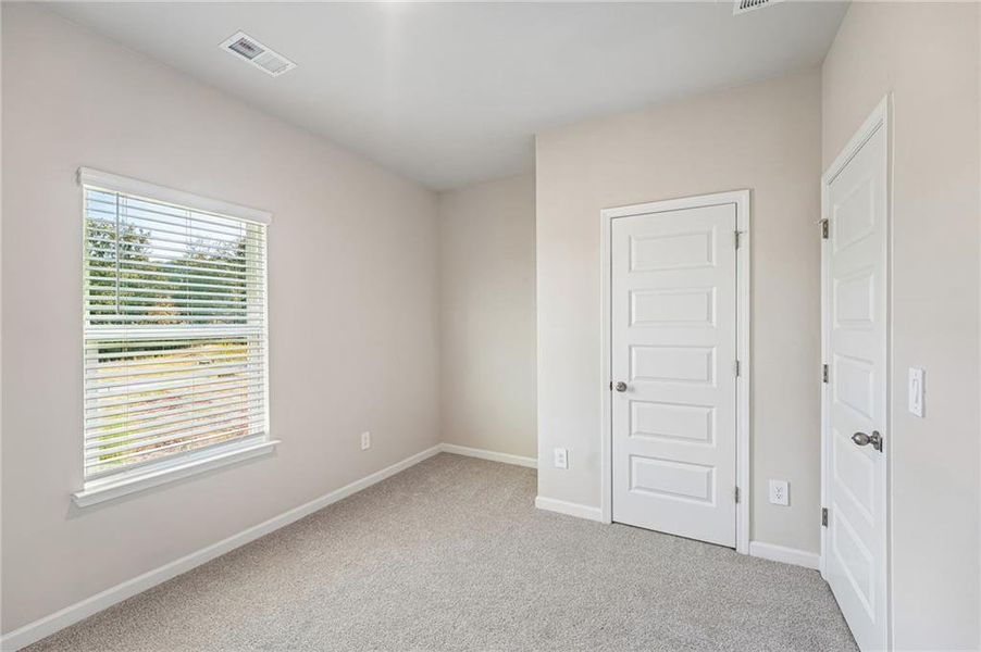 Spacious, unfurnished interior of a new home in Hemingway - Reserve Series, Cumming (Image 60).