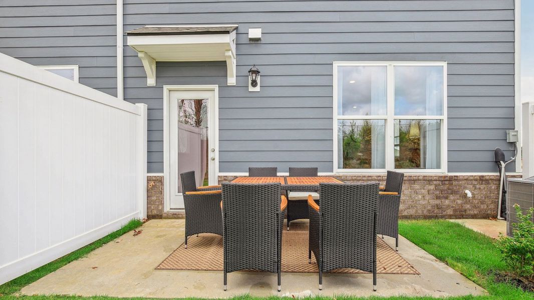 Exterior details and patio area of a home in River Landing Townhomes, Murfreesboro (Image 2).