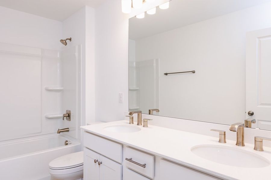 Representative furnished interior of a home built from the Willow by Taylor Morrison in Forestville Station, Wake Forest (Image 23).