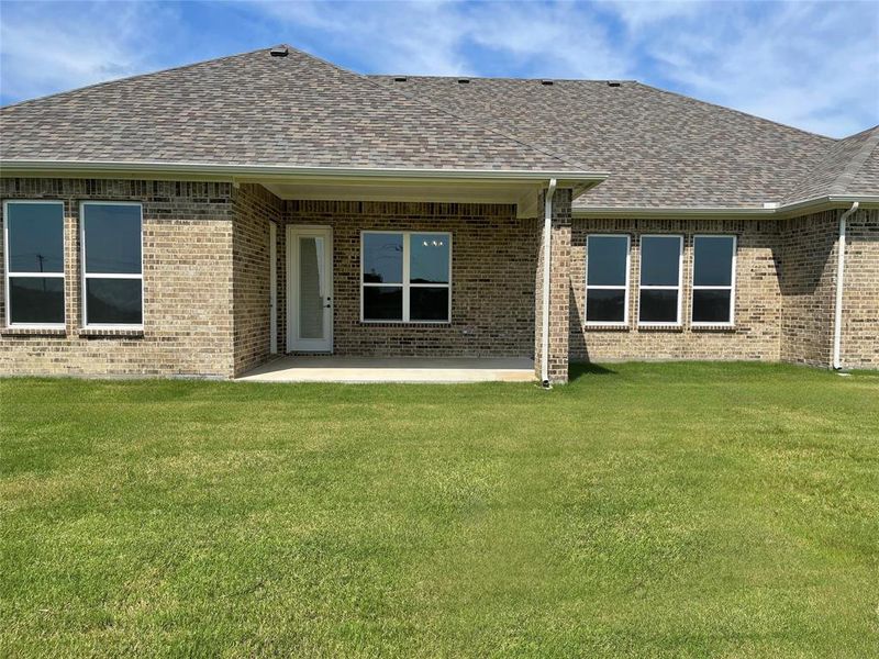 Exterior details and patio area of a home in The Ranch at Stone Hill, Waxahachie (Image 3).