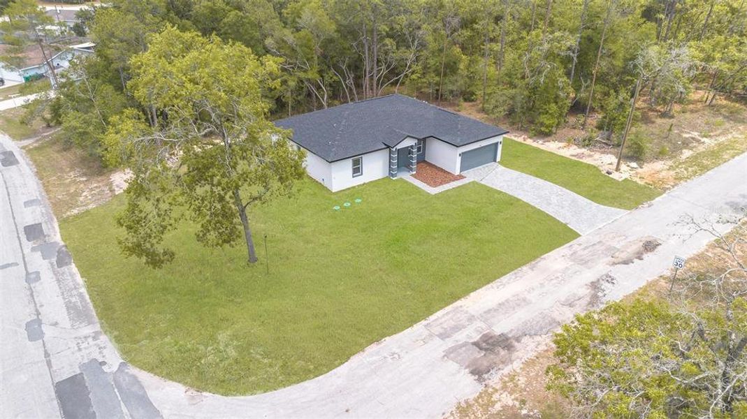 Front exterior of a new home in , Dunnellon, FL, highlighting curb appeal (Image 28).