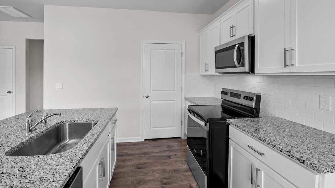 Furnished interior view inside a new home in Tyler - Home on the Lake, New Bern (Image 4).