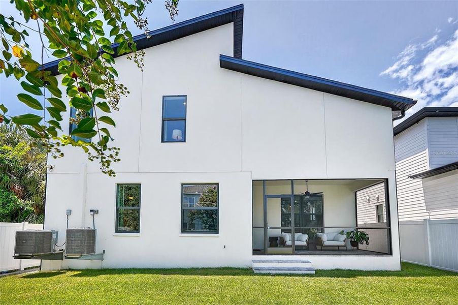 Front exterior of a new home in , Tampa, FL, highlighting curb appeal (Image 25).