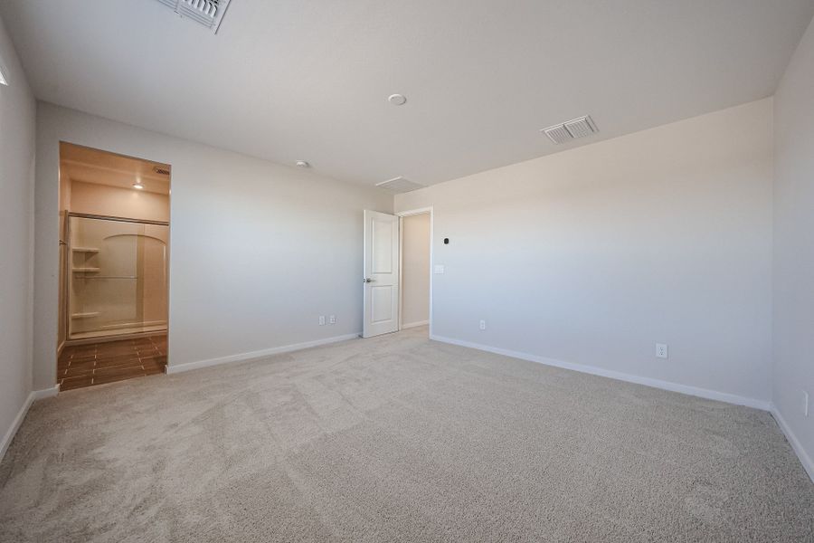 A room with white walls and a wood floor. A room with white walls and a wood floor.