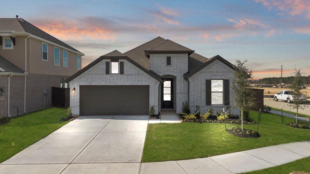 Front exterior of a new home in The Trails 50', New Caney, TX, highlighting curb appeal (Image 22).
