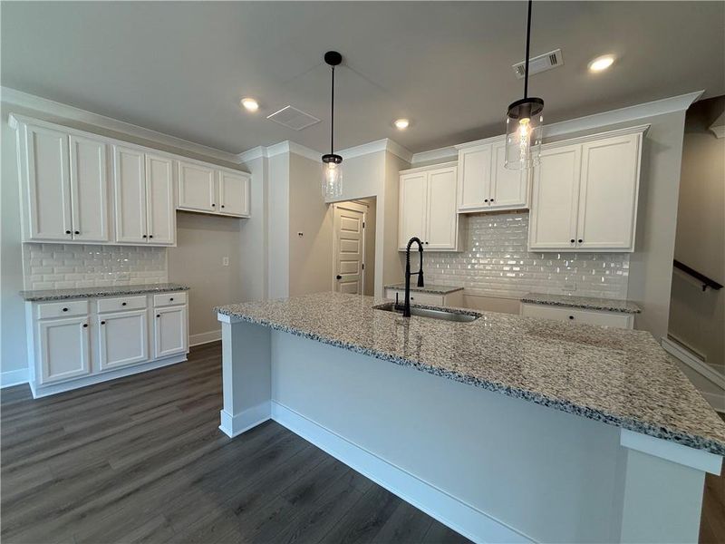 Furnished interior view inside a new home in The Towns at Auburn Station East, Auburn (Image 7).