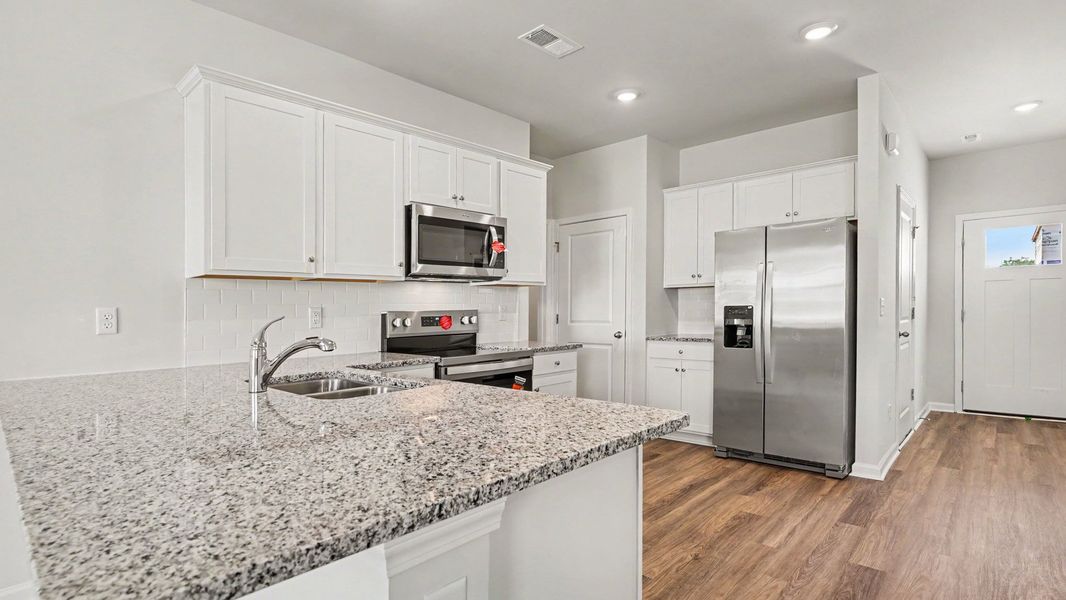 Furnished interior view inside a new home in The Meadows at Wildwood Village, Shallotte (Image 5).