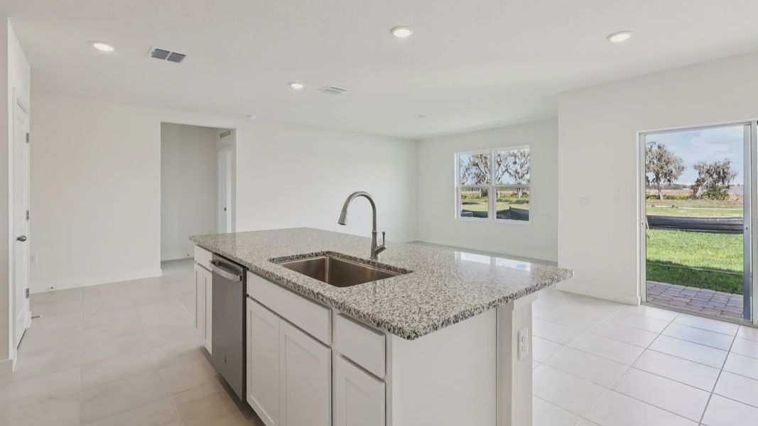 Kitchen of the Baker Floor Plan by DRB Homes in Liberty Trace New Homes in Haines City